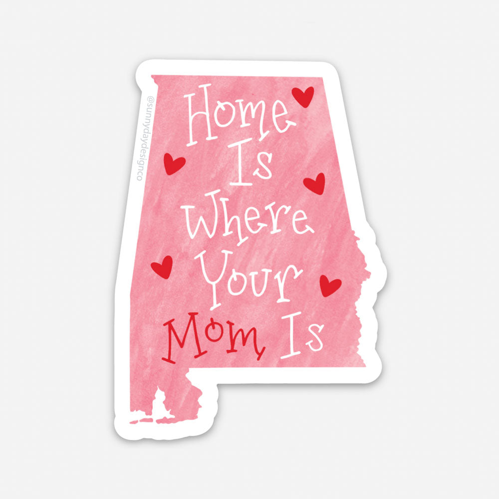 alabama mom vinyl sticker of alabama state shape on pink background with white and red text and hearts by Sunny Day Designs