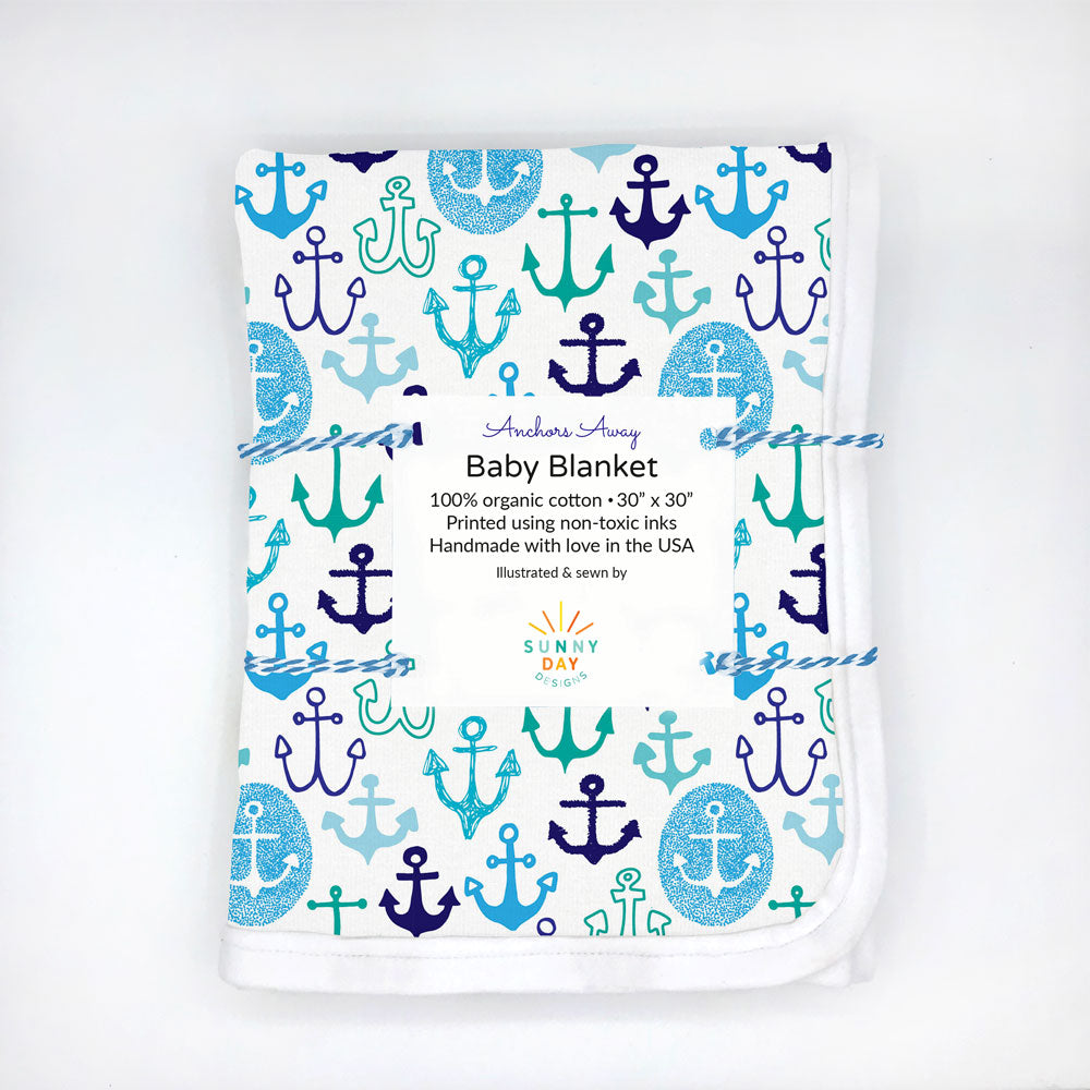 anchors away baby blanket with anchor design in blue and green on white background by Sunny Day Designs
