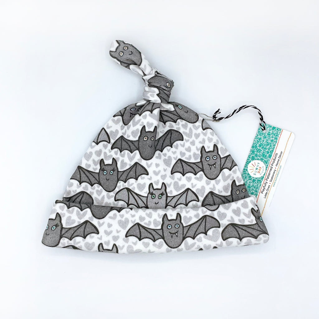 This adorable gray organic cotton baby hat features our cute Benevolent Bats Halloween print design. Each organic baby hat by Sunny Day Designs is made in the USA from organic cotton