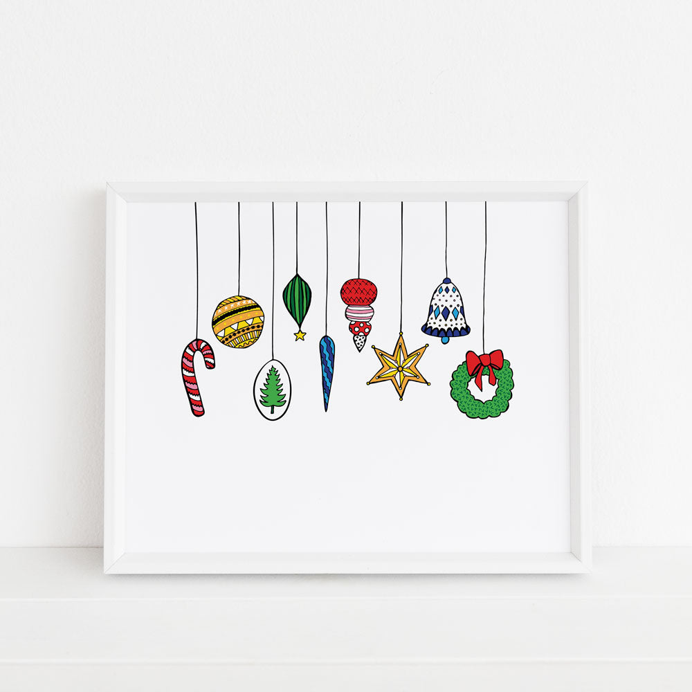 this Christmas Ornaments 8x10 art print by Sunny Day Designs features 9 colorful holiday Xmas ornaments hanging from strings on a white background. This illustration is proudly made in the USA and printed on watercolor paper.