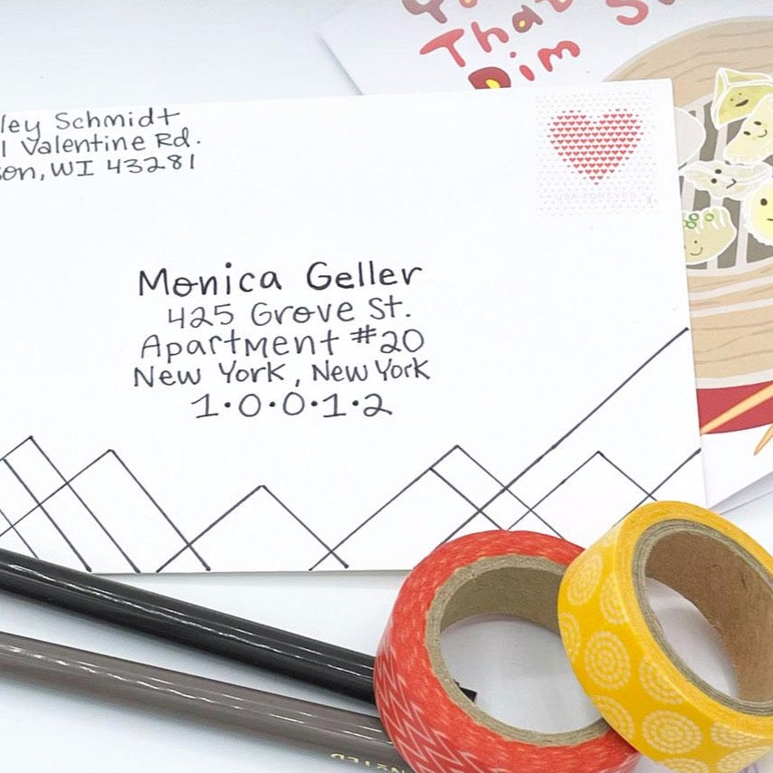 Greeting Card Envelope Addressed with Colorful Washi Tape and All That And Dim Sum greeting card in background