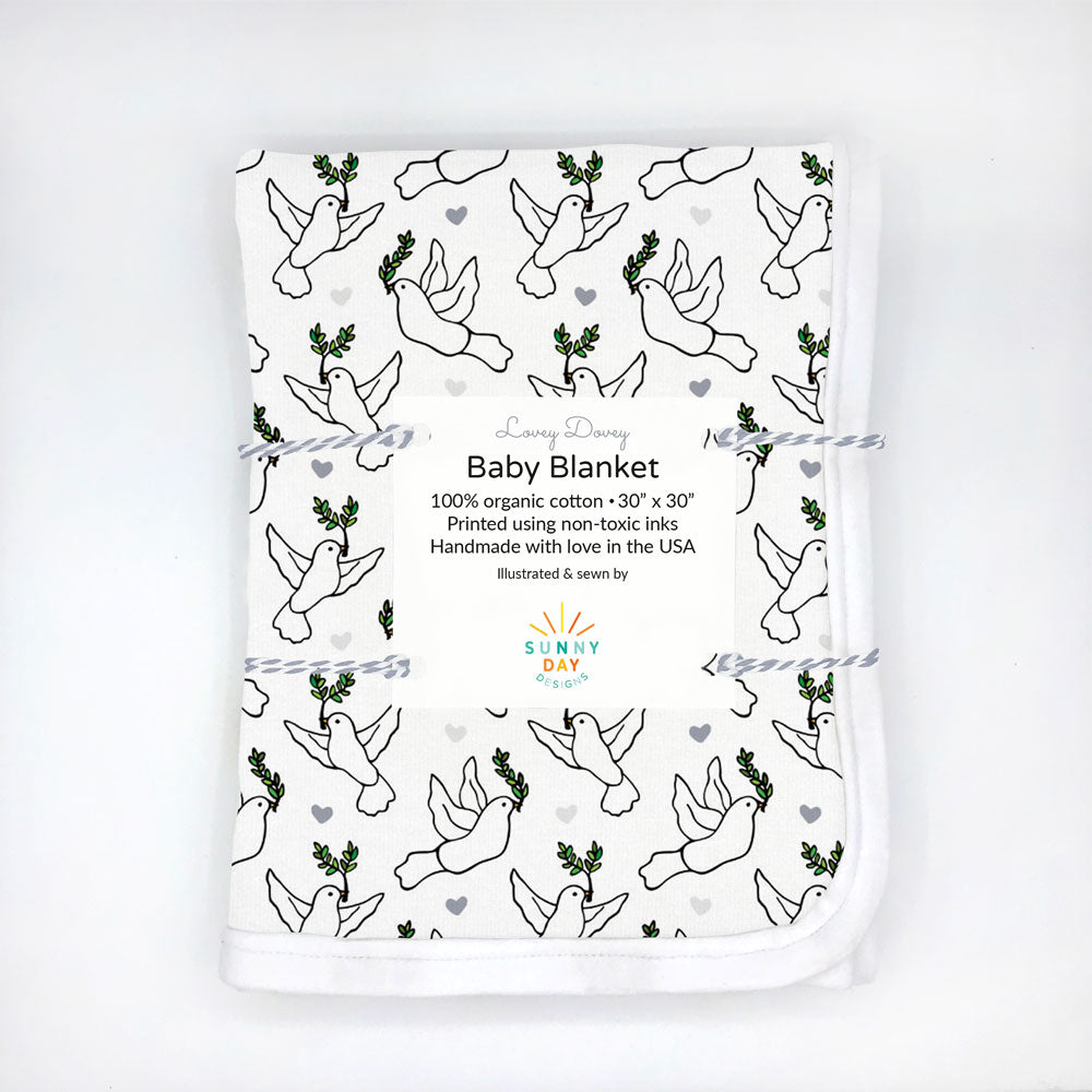 lovey dovey baby blanket with doves and greens on white background by Sunny Day Designs