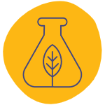 A yellow circle icon representing products printed with non-toxic inks is shown by a navy blue drawing of a chemistry beaker with a plant leaf inside appearing inside the center of a yellow circle, which is surrounded by a white background.