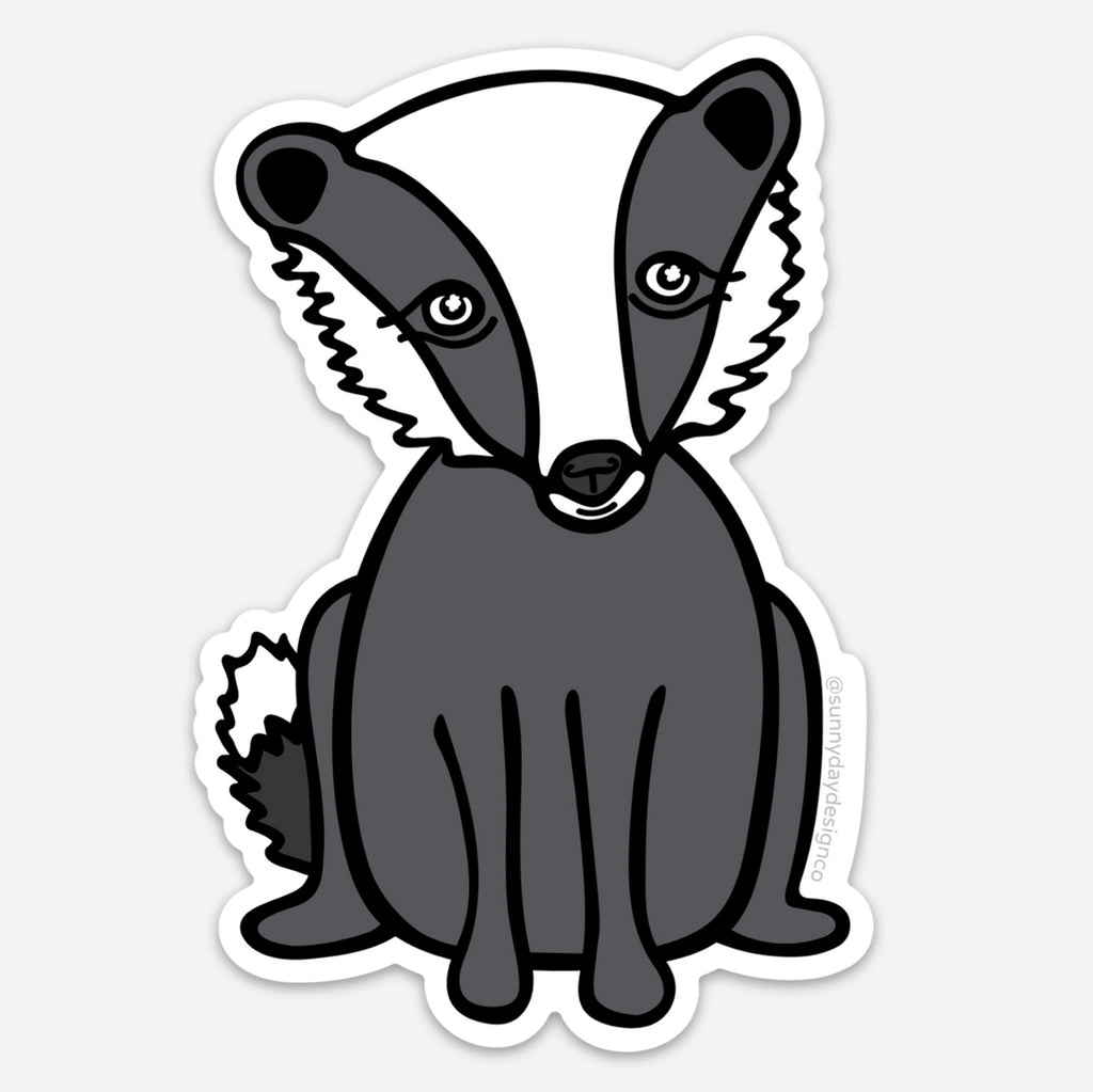 An adorable die cut animal-themed vinyl magnet with a gray, black, and white illustration of a badger - designed by Sunny Day Designs