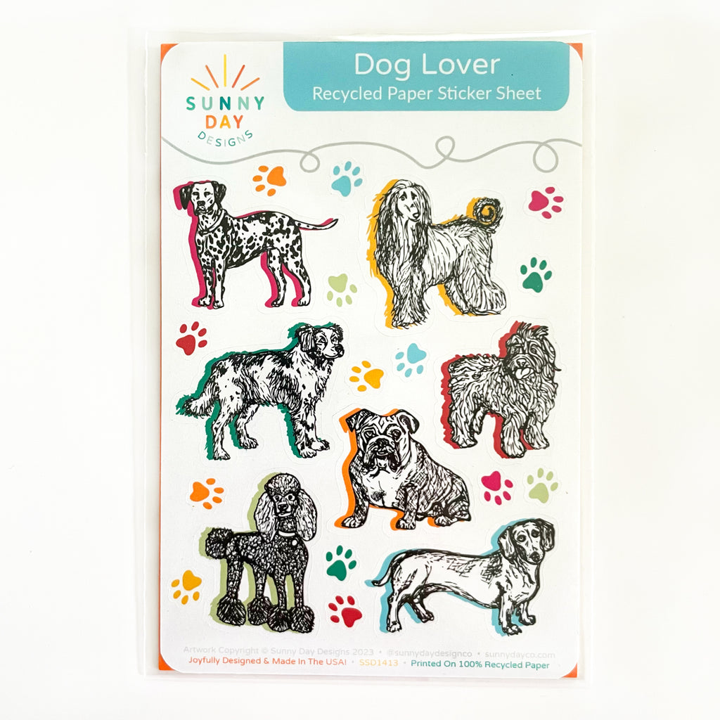 A colorful dog themed sticker sheet made from recycled paper is shown packaged on a white background.