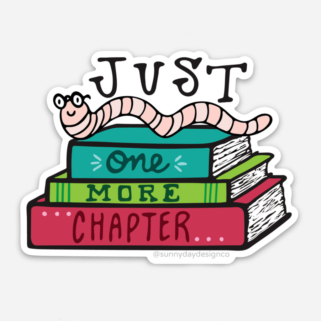 A fun reading sticker design for laptops is shown, this cute vinyl sticker features 3 colorful books stacked together with a smiling pink bookworm wearing glasses perched on top of the stack of books. The words "Just One More Chapter" are also on the sticker, making it a perfect reading gift for any book lover!