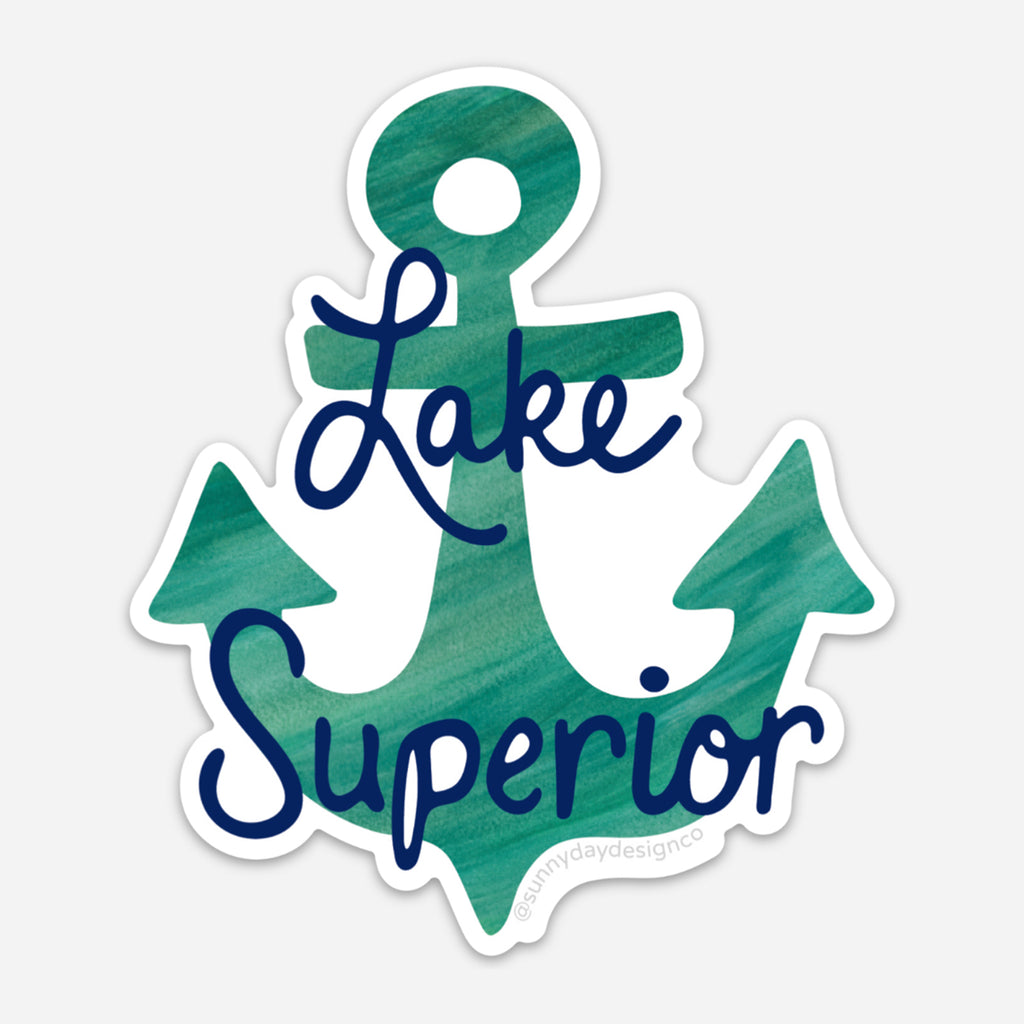 A thin vinyl coated Great Lakes souvenir magnet of Lake Superior featuring a turquoise watercolor anchor and blue handlettered "Lake Superior" text.