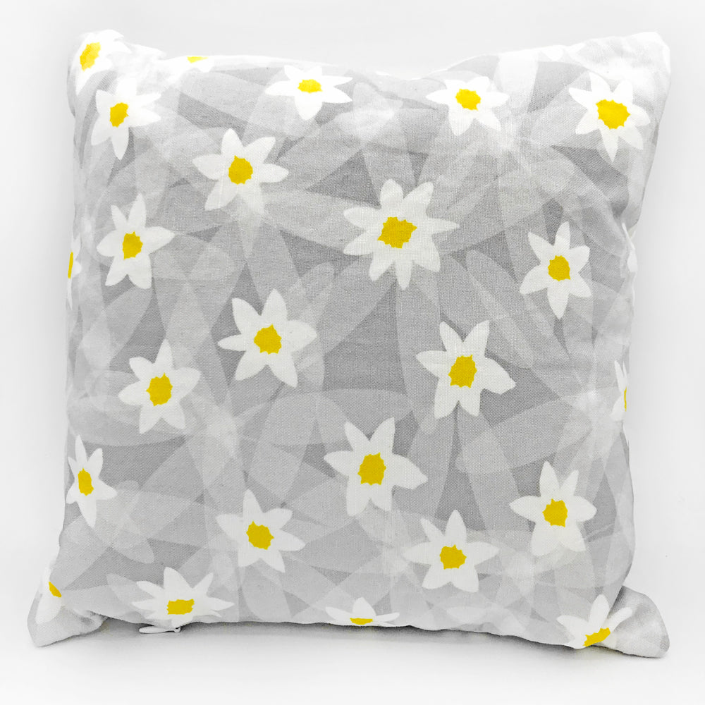 This small gray/yellow/white floral daisy printed 11"x11" square linen/cotton fabric throw pillow is made in the USA and features a cute spring flower print by Sunny Day Designs