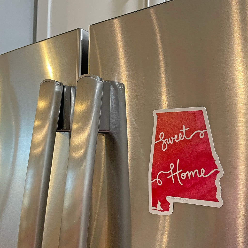 Crimson red Sweet Home Alabama watercolor fun vinyl magnet by Sunny Day Designs. This AL state shaped magnet is perfect for anyone from Alabama. Made in the USA.