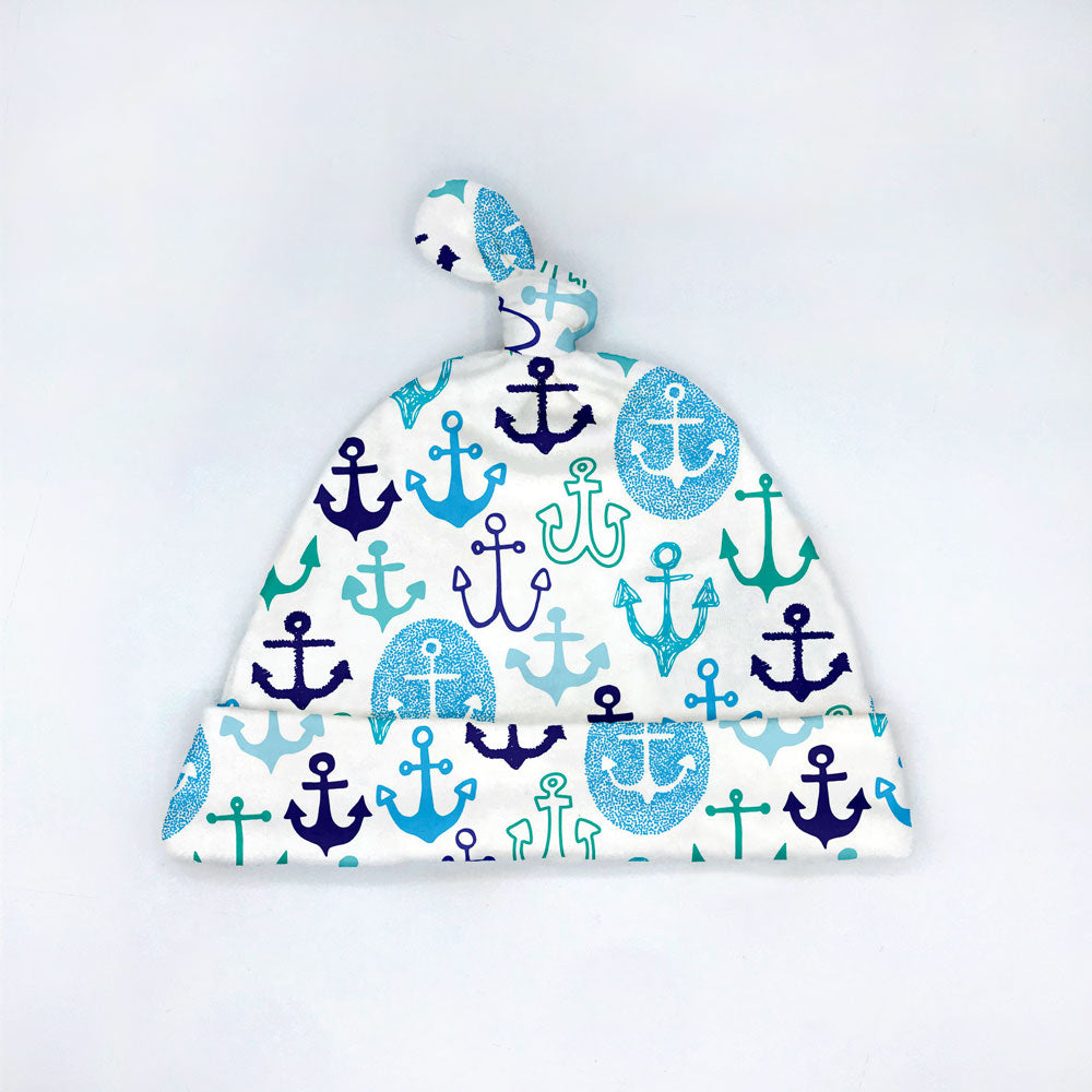anchors away baby hat with blue and green anchors on white background by Sunny Day Designs
