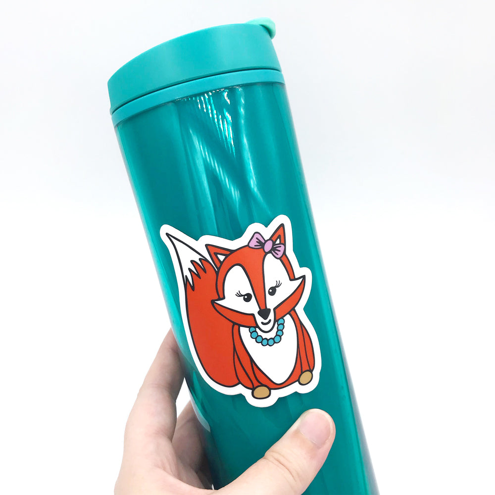 foxy lady cute orange fox vinyl sticker on turquoise water bottle by sunny day designs