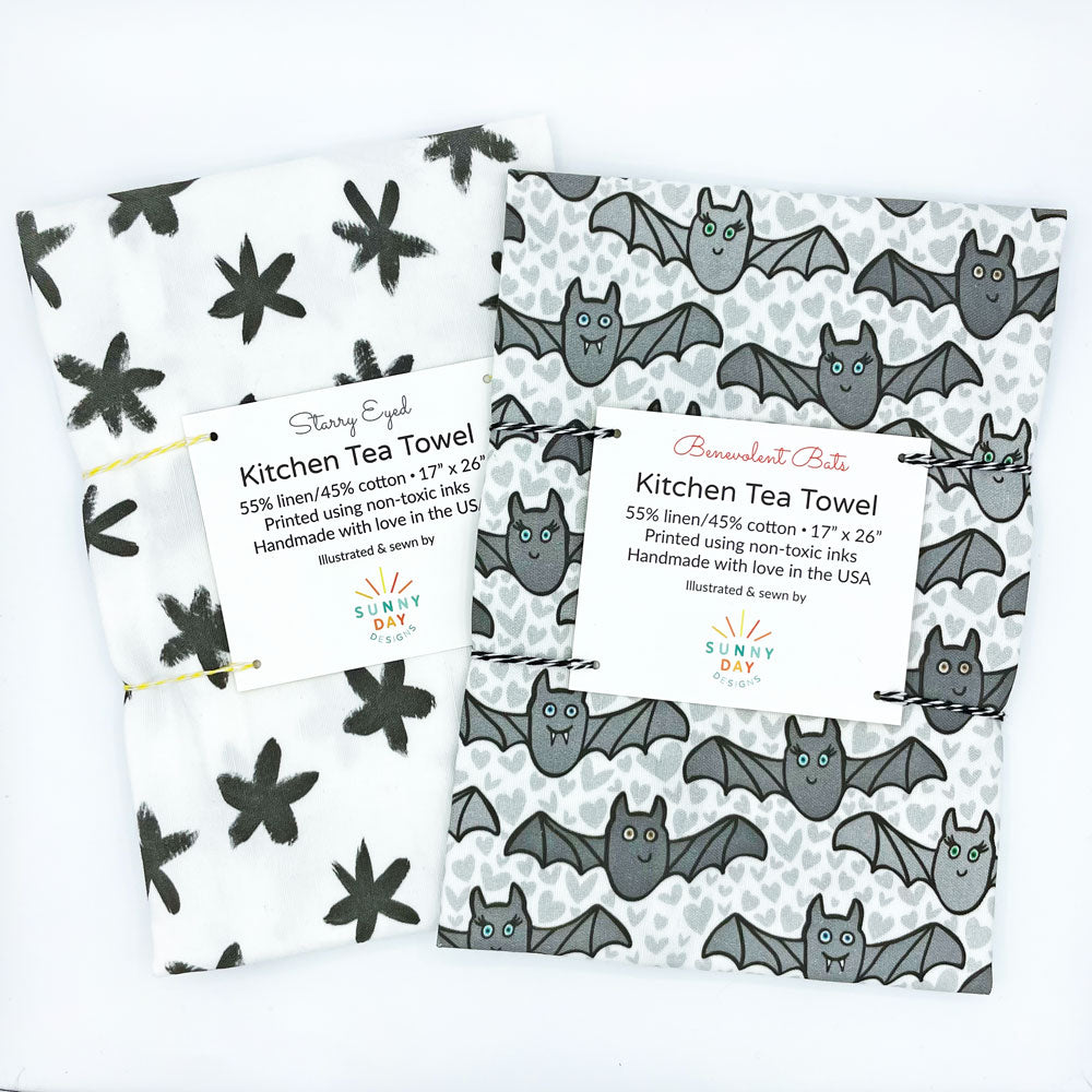 https://sunnydayco.com/cdn/shop/products/Halloween-Tea-Towel-Set-of-2-Starry-Eyed-Benevolent-Bats-Sunny-Day-Designs-LowRes_1000x.jpg?v=1669343851