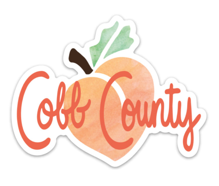 sweet peach magnet on orange background with cobb county text