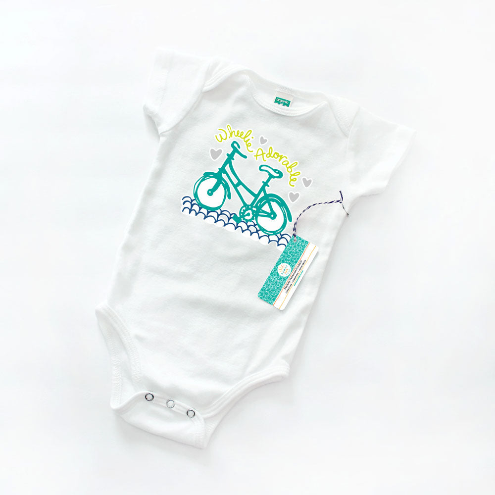 Wheelie Adorable bicycle themed organic cotton baby onesie by Sunny Day Designs. Made in the USA.